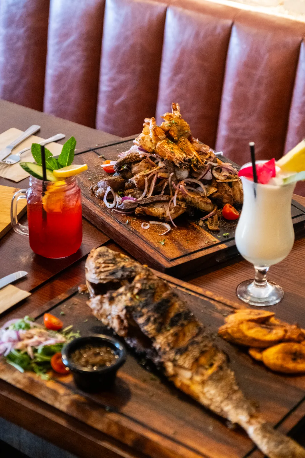 Whole grilled fish and a generous sharing spread